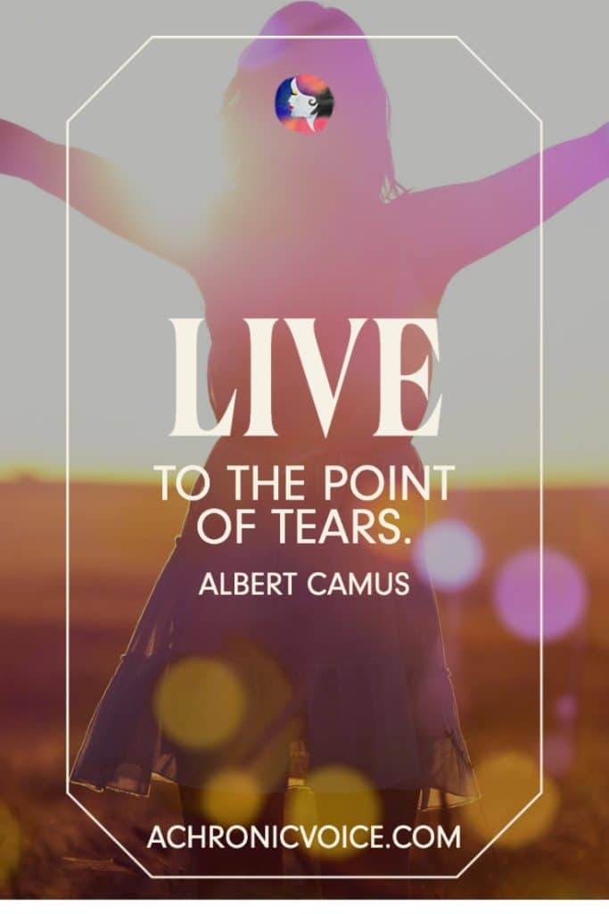 “Live to the point of tears.” - Albert Camus (Background: Silhouette of a girl's back, with long hair and outstretched arms, standing in an open field with bokeh.)